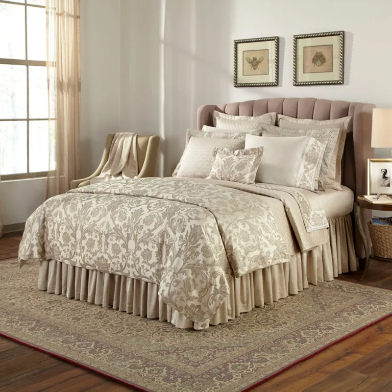 Home Treasures Anastasia quilted coverlet set in champagne damask jacquard on styled bed.