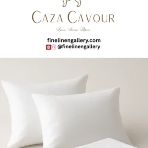 Caza Cavour 400TC Egyptian cotton percale sheet set with hemstitch, folded with two pillows on top, showcasing luxurious bedding.